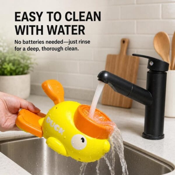 cat-dog-toys-31-2 washable duck puzzle feeder cleaning scene running tap water flushing whole plastic duck pet toy inside kitchen sink