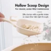 cat-litter-scoop-38-3 hollow slotted cat pooper scooper in hand shaking to demonstrate clean litter falling through mesh holes for easy sifting