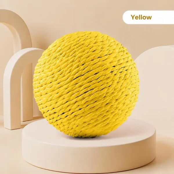 cat-toy-ball-40-4 bright yellow woven sisal cat toy ball full product shot on neutral beige display platform
