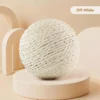 cat-toy-ball-40-5 off white sisal rope cat toy ball full product shot on curved beige display stand