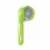 pet-bath-brush-34-10 press dispense silicone pet bath massager full standalone overall product shot solid white background green long handle groomer with transparent liquid tank and round silicone brush head hanging hole on grip end