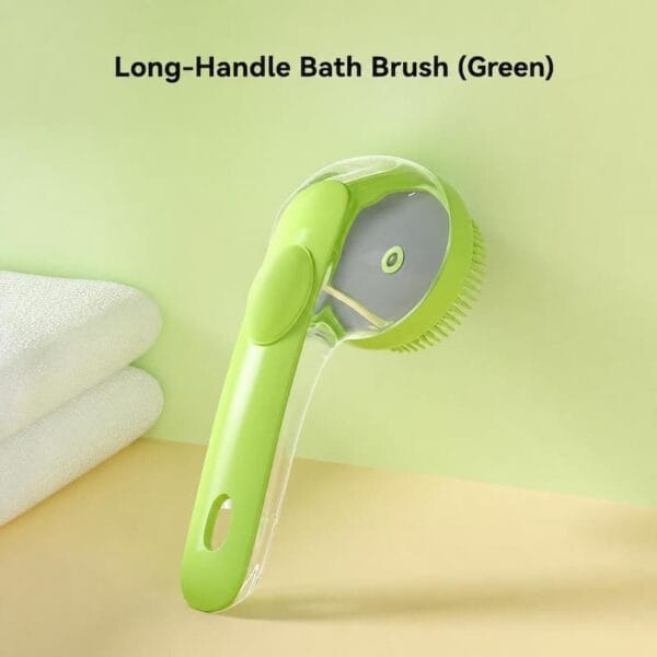 pet-bath-brush-34-4 long handle pet bath brush green full overall product display shot against light green wall hanging hole on end of ergonomic handle transparent shampoo tank section